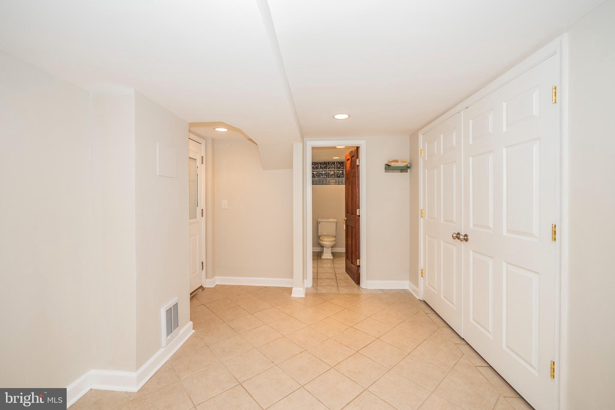 8933 Watkins Road Gaithersburg, MD 20882 - Photo 54 of 65 Lower Level - Bedroom #4 w/ Walkout to Rear Patio