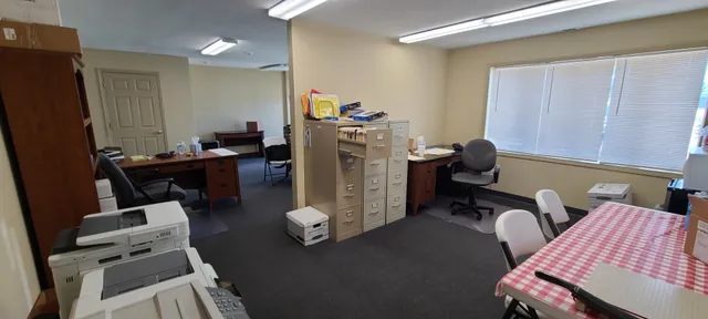 a work room with furniture