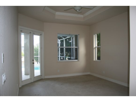 331 Waterleaf Court Marco Island, FL 34145 - Photo 3 of 5 a room that has a window in it