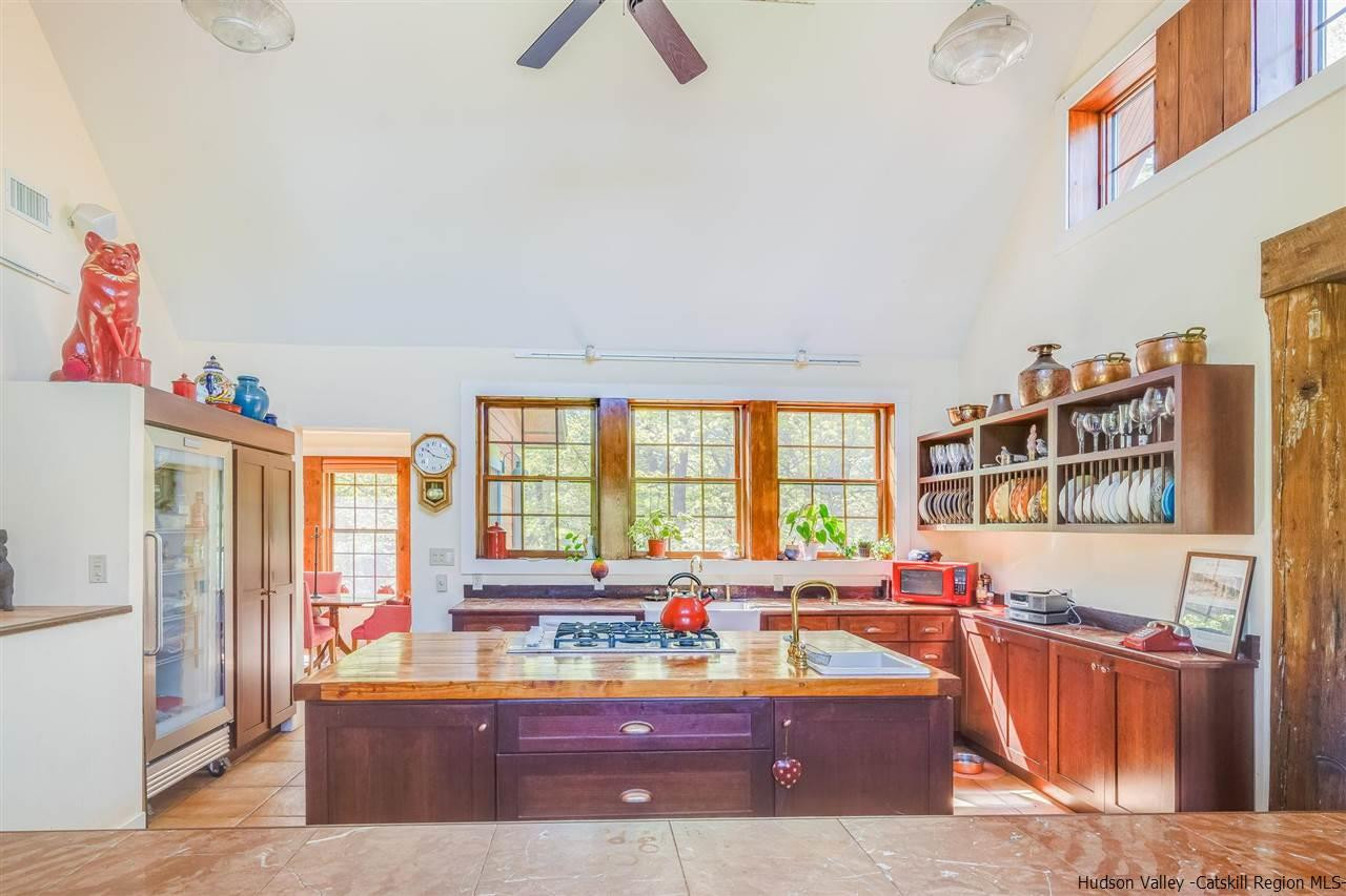 1245 High Falls Road Catskill, NY 12414 - Photo 12 of 34 a living room with furniture and a large window