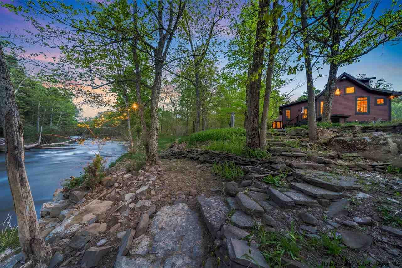 1245 High Falls Road Catskill, NY 12414 - Photo 2 of 34 a view of a backyard with large trees