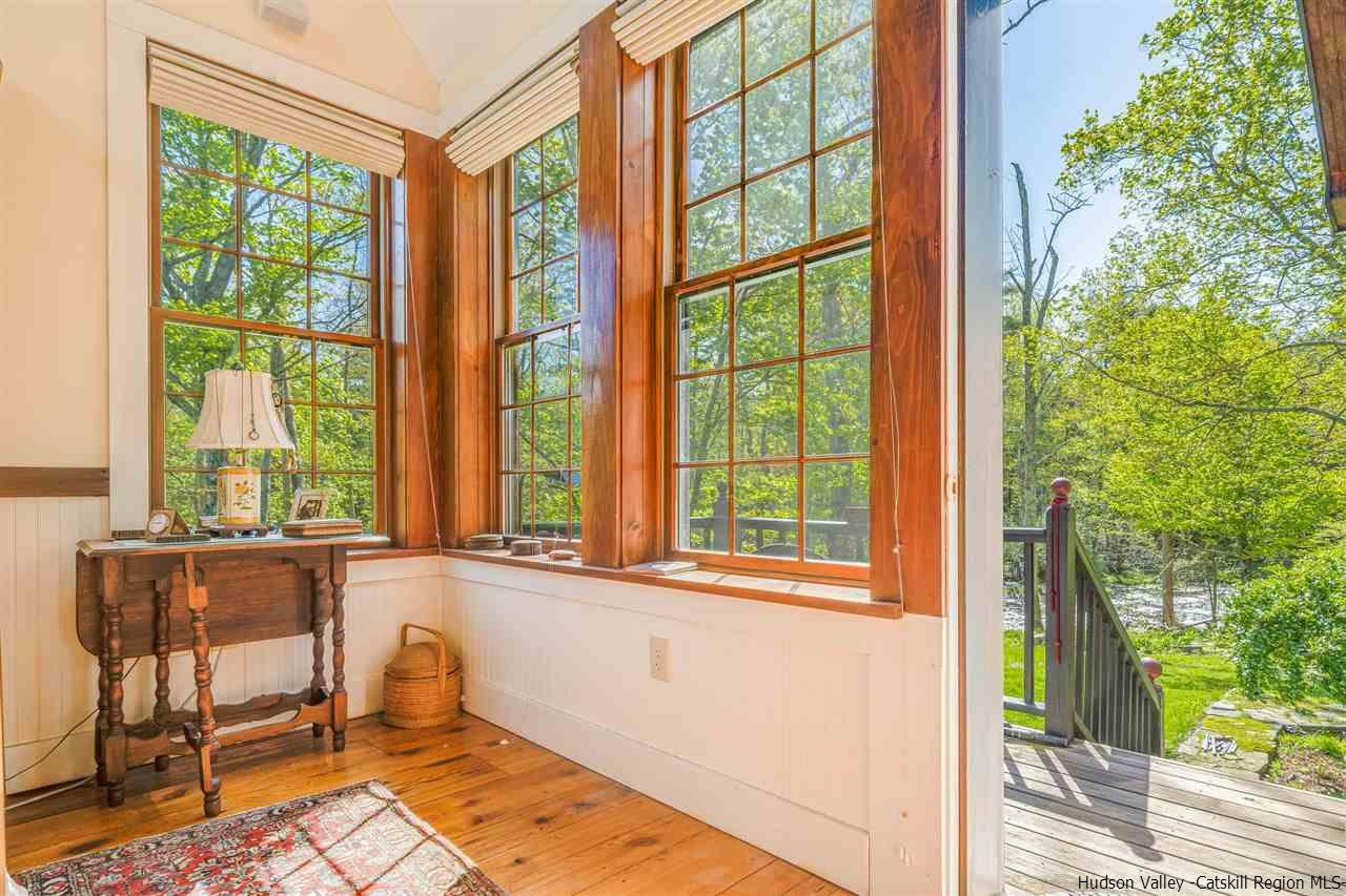 1245 High Falls Road Catskill, NY 12414 - Photo 22 of 34 a living room filled with furniture and a window