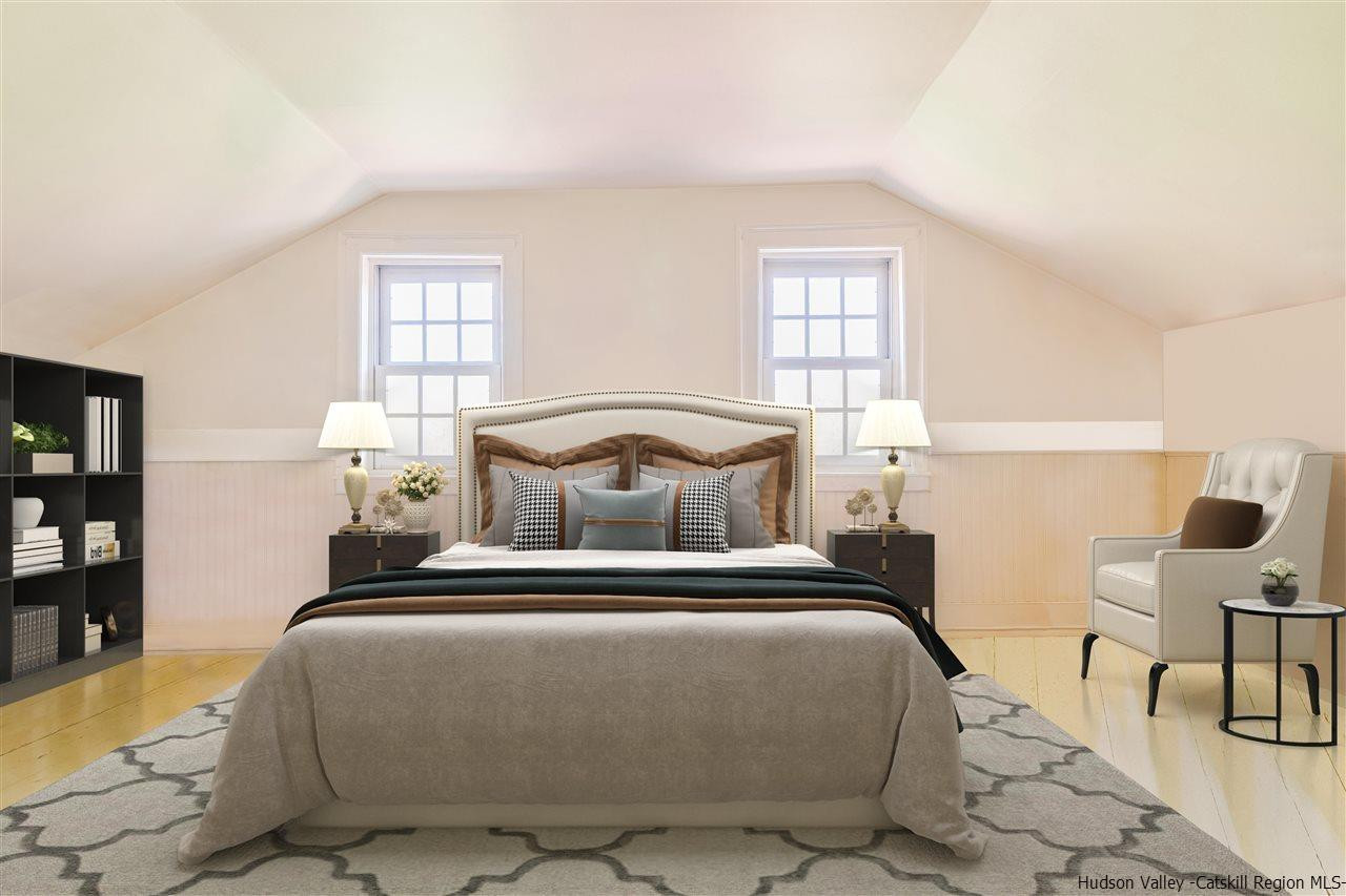 1245 High Falls Road Catskill, NY 12414 - Photo 26 of 34 a bedroom with a bed and window