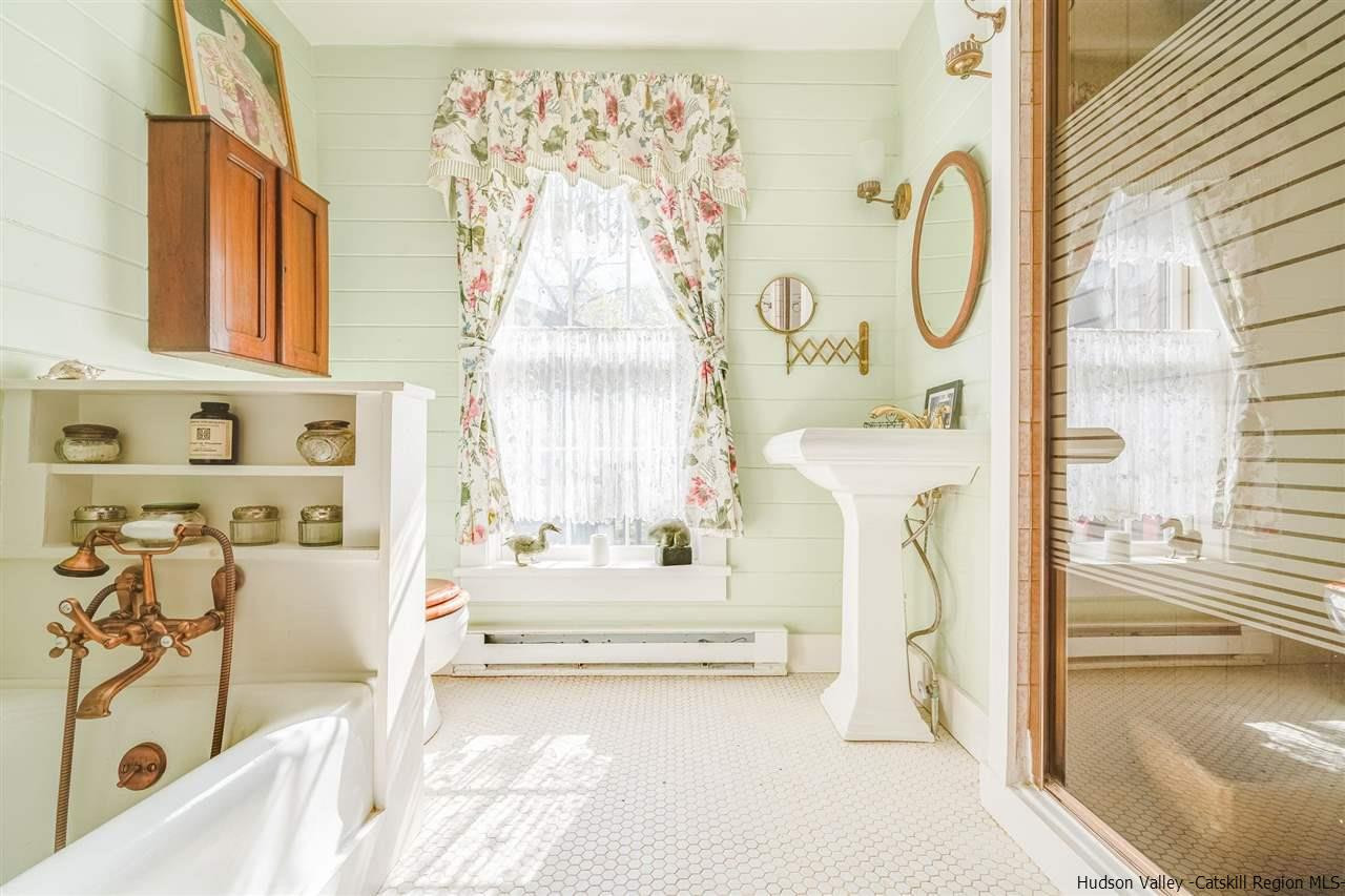 1245 High Falls Road Catskill, NY 12414 - Photo 27 of 34 a spacious bathroom with a bathtub and a shower