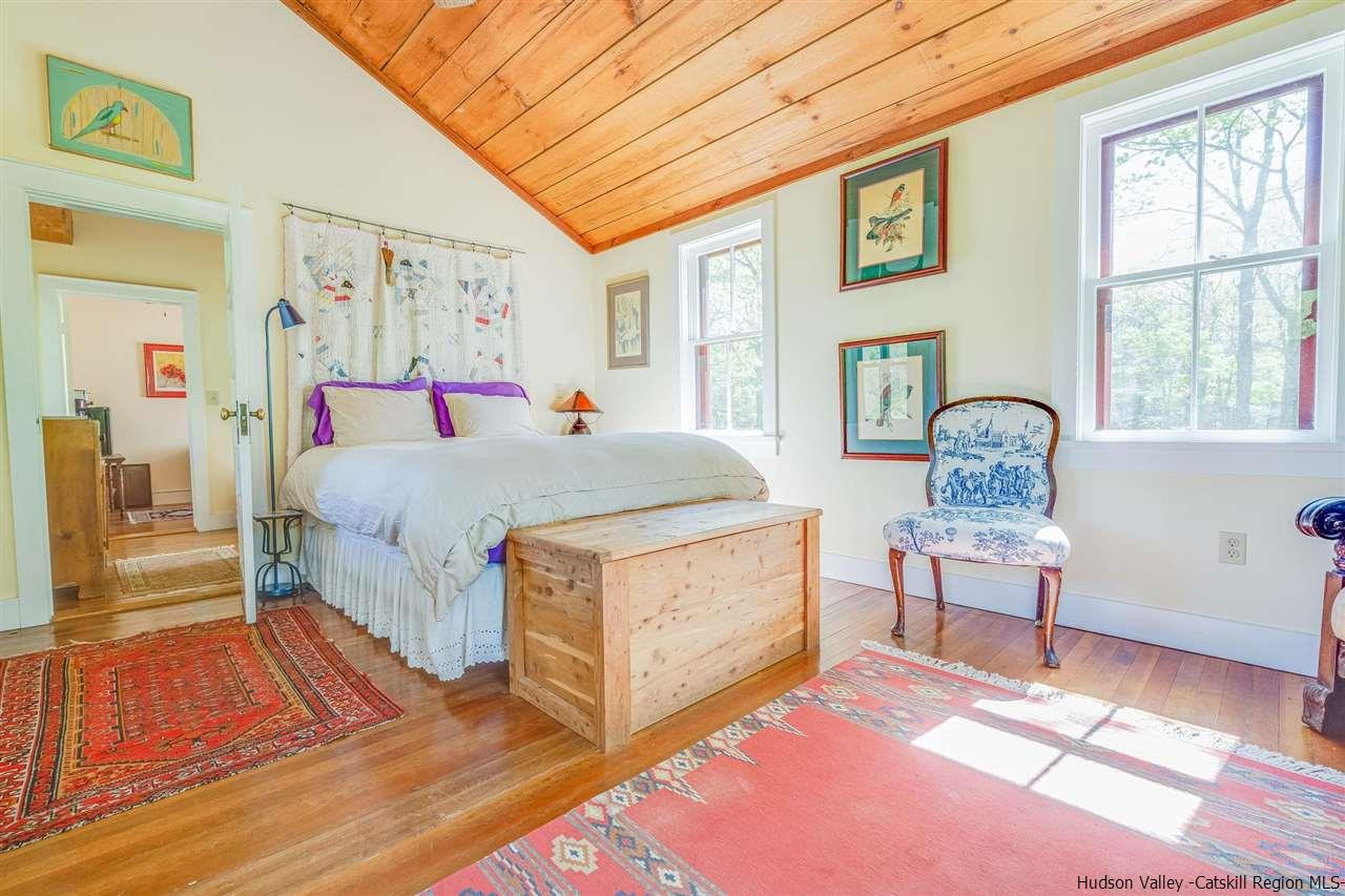 1245 High Falls Road Catskill, NY 12414 - Photo 29 of 34 a bedroom with a bed chair and a window