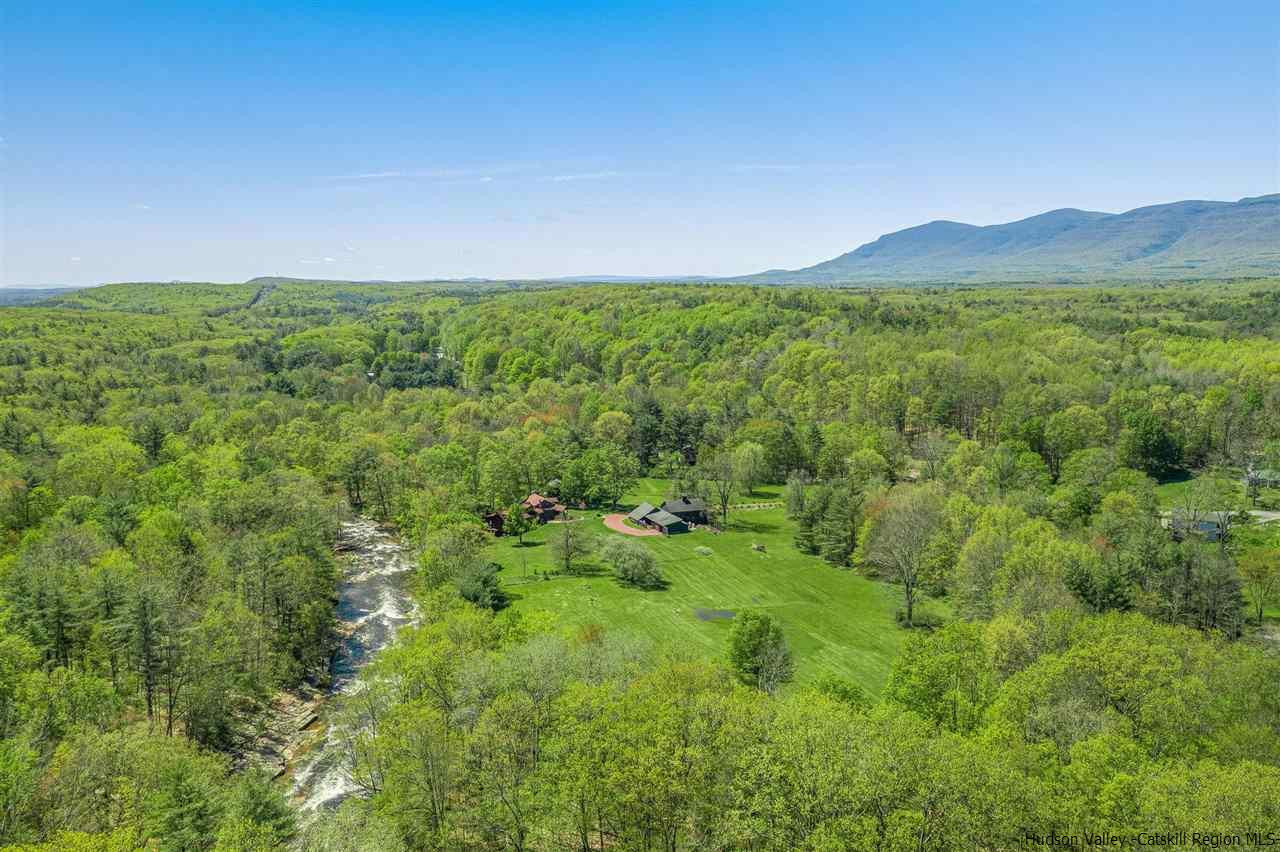 1245 High Falls Road Catskill, NY 12414 - Photo 5 of 34 a view of a lush green outdoor space with a lake view