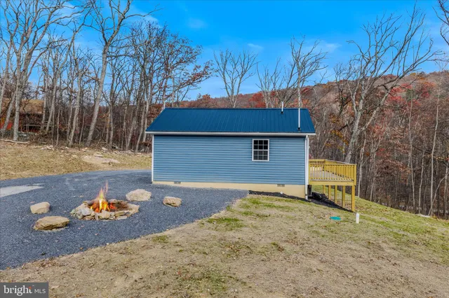 a backyard of a house with lots of green space