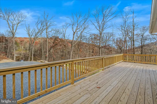 a view of balcony with wooden floor