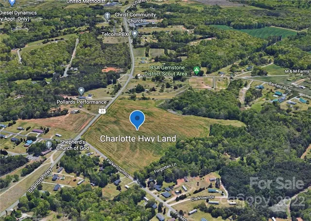 an aerial view of a trees all around