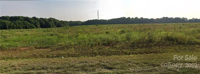 a view of a lake with a mountain in the background