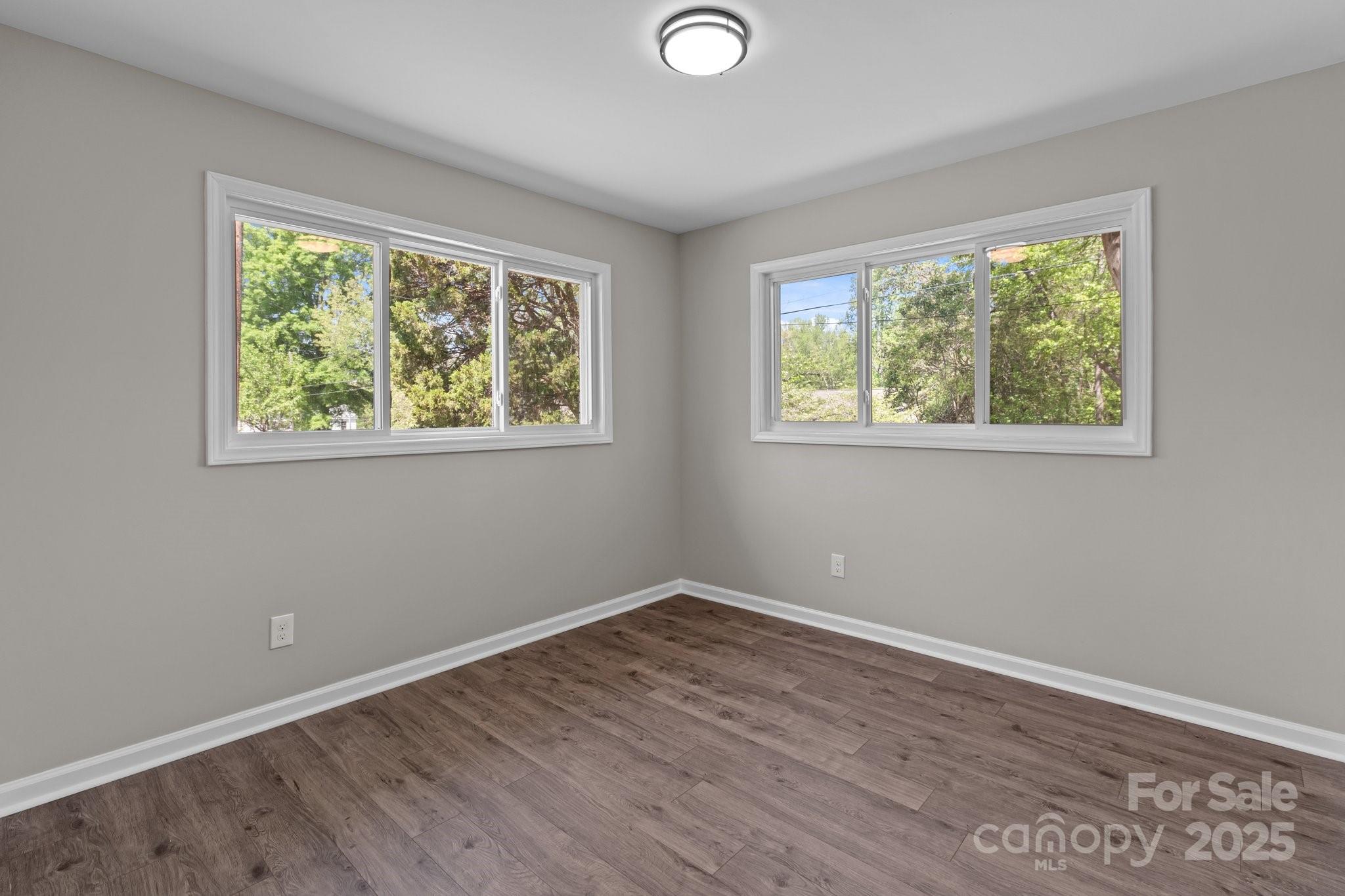 880 Legion Club Road Salisbury, NC 28146 - Photo 23 of 35 a view of a room with wooden floor and windows