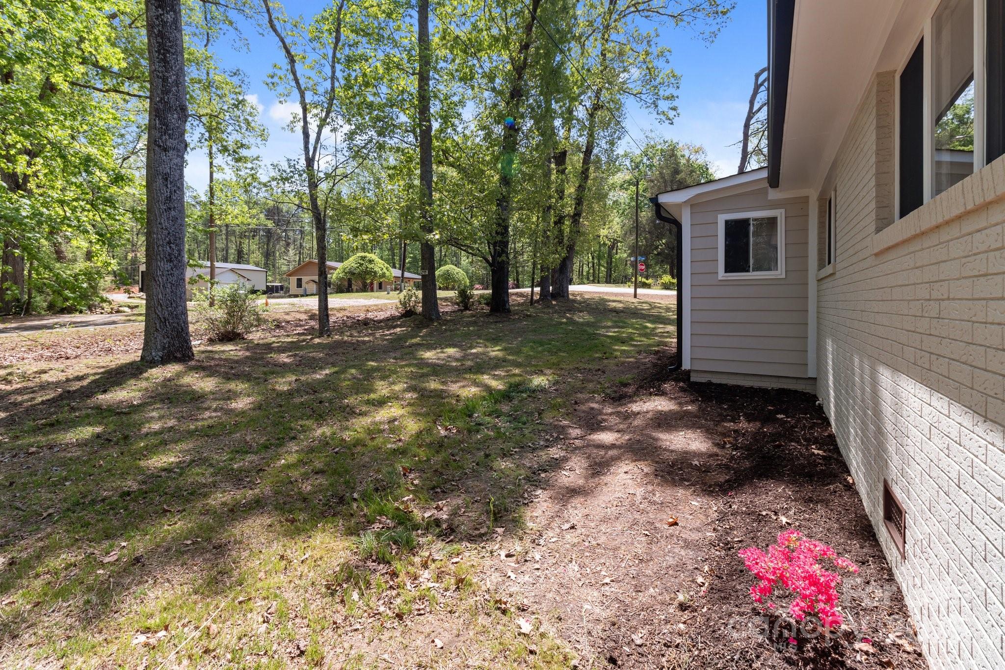 880 Legion Club Road Salisbury, NC 28146 - Photo 32 of 35 a view of a yard with a tree