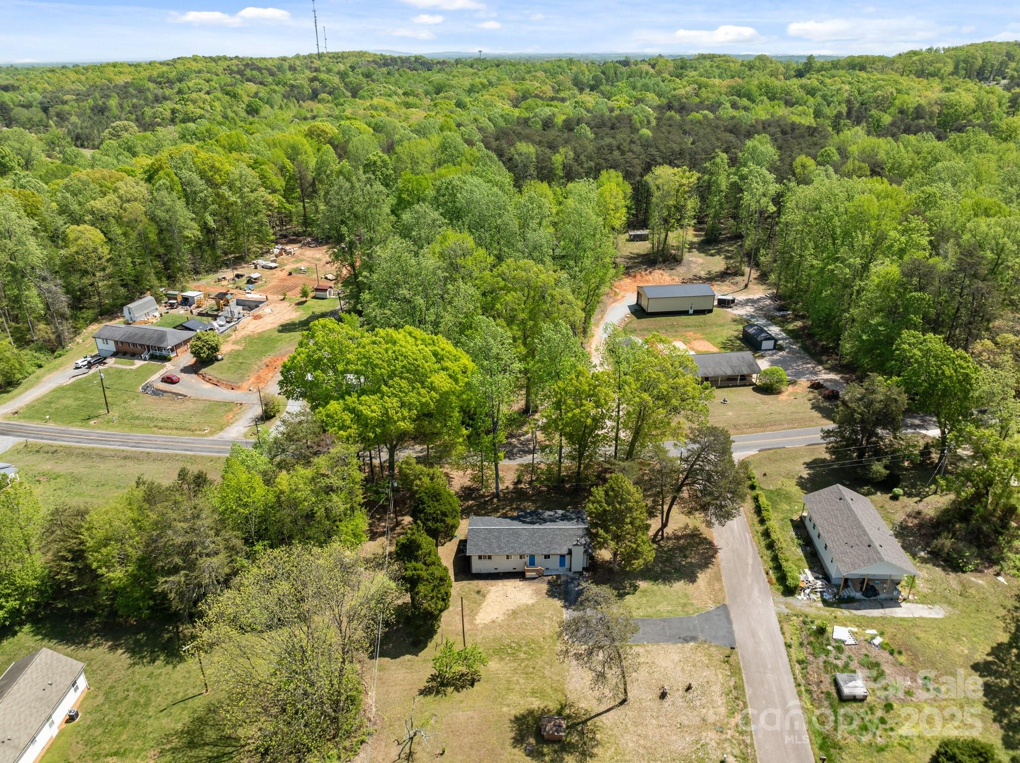 880 Legion Club Road Salisbury, NC 28146 - Photo 34 of 35 a view of a city with lush green forest