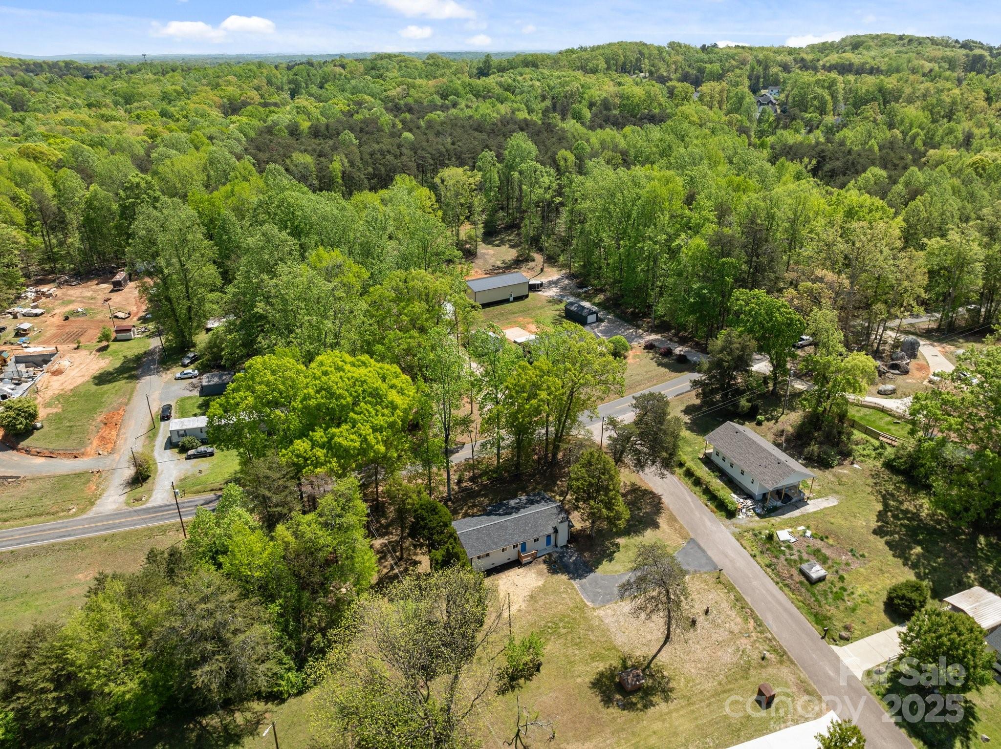 880 Legion Club Road Salisbury, NC 28146 - Photo 35 of 35 a view of a forest with a street