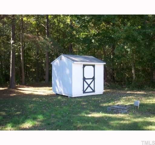1439 Lee Road Clayton, NC 27520 - Photo 7 of 10 a view of a back yard