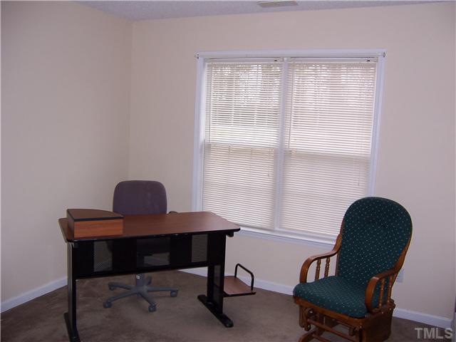1439 Lee Road Clayton, NC 27520 - Photo 9 of 10 a work place with furniture and a window