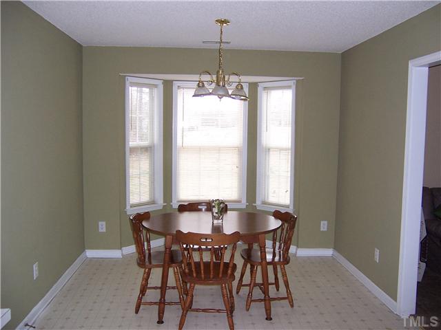 1439 Lee Road Clayton, NC 27520 - Photo 10 of 10 a dining room with furniture window and outside view