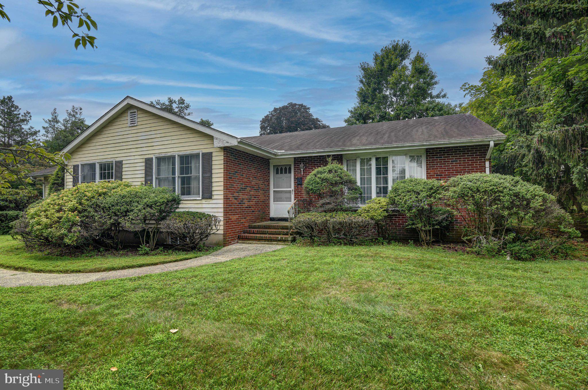 19 Crown Road Trenton, NJ 08638 - Photo 1 of 27 Charming brick home with lush greenery.