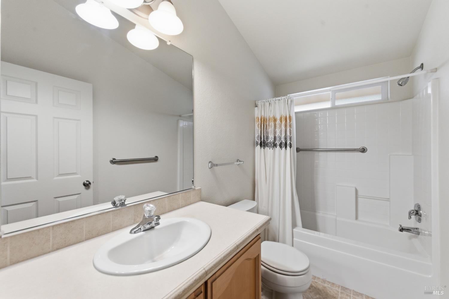 2412 Foothill Boulevard, Unit 15 Calistoga, CA 94515 - Photo 15 of 16 a bathroom with a sink toilet and shower