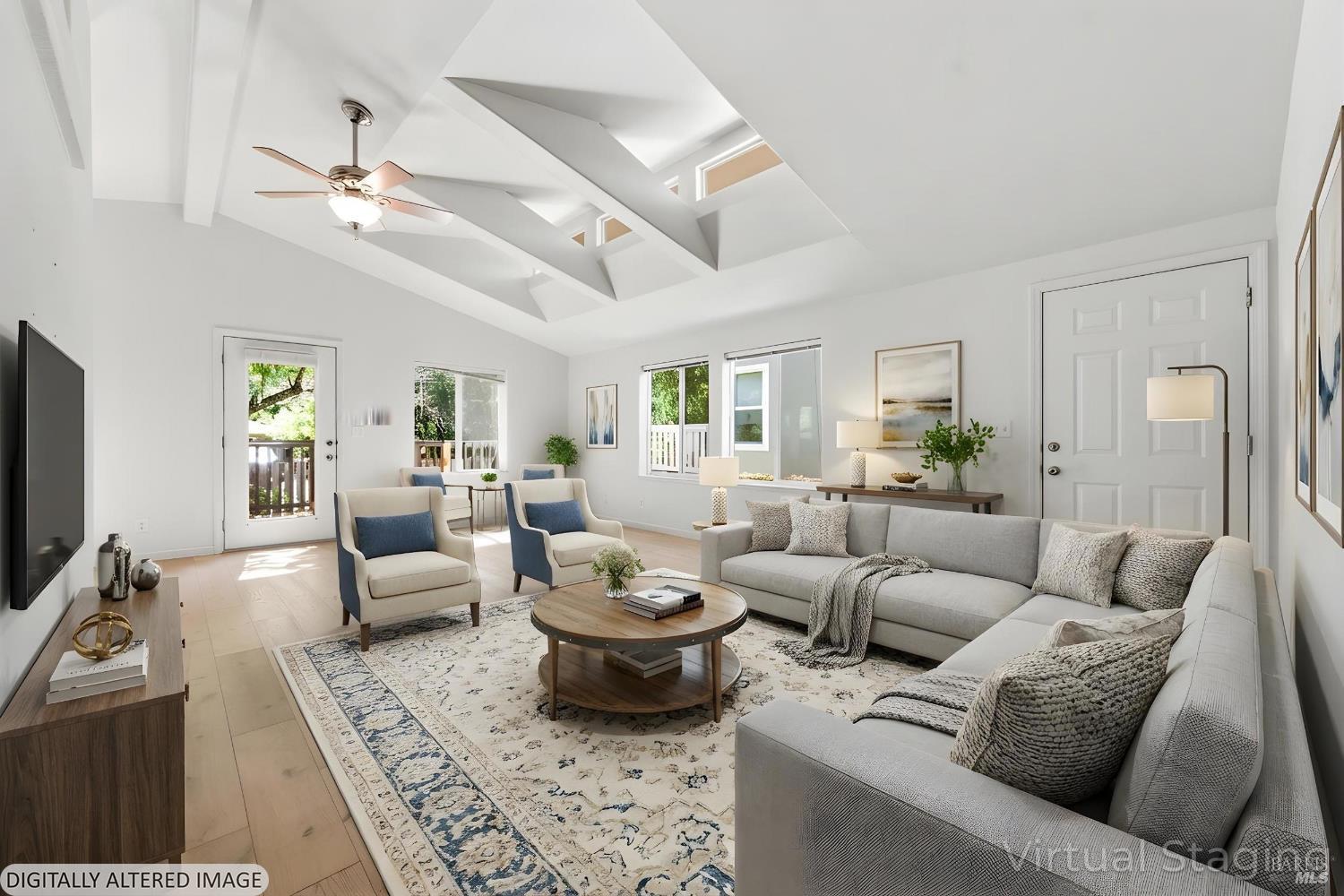 2412 Foothill Boulevard, Unit 15 Calistoga, CA 94515 - Photo 3 of 16 a living room with furniture and a flat screen tv