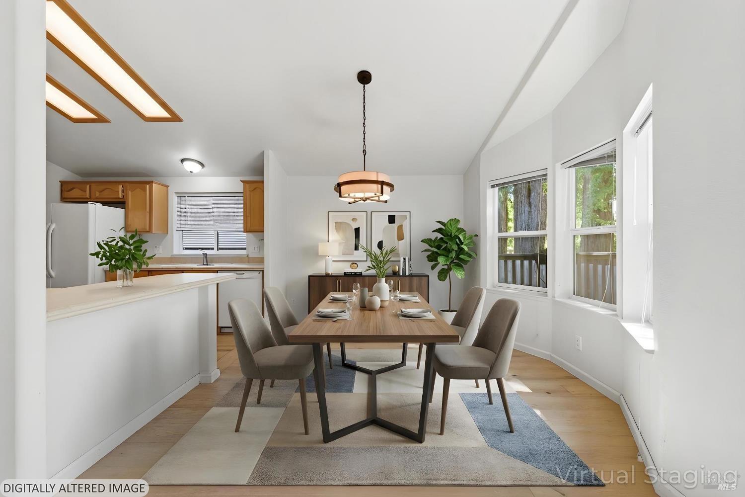 2412 Foothill Boulevard, Unit 15 Calistoga, CA 94515 - Photo 4 of 16 a view of a dining room with furniture window and wooden floor