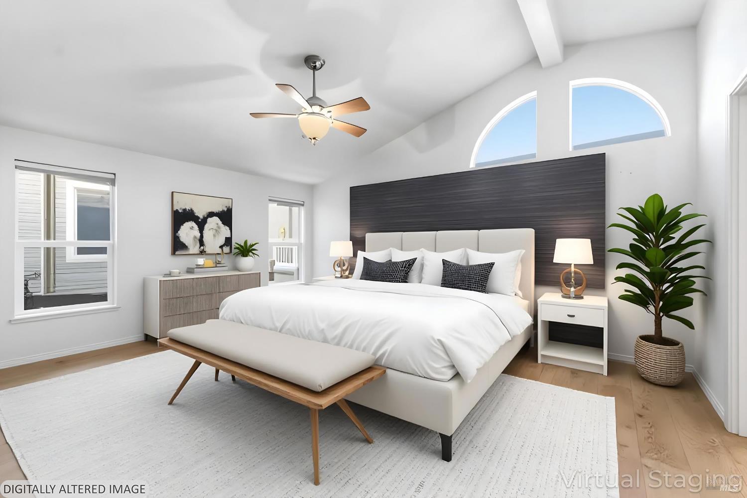 2412 Foothill Boulevard, Unit 15 Calistoga, CA 94515 - Photo 10 of 16 a bedroom with a bed furniture and a potted plant