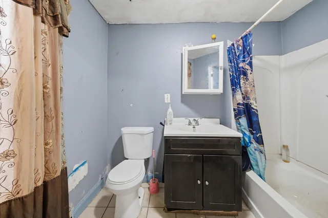 a bathroom with a sink and toilet