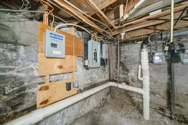 a bathroom with a tub and shower