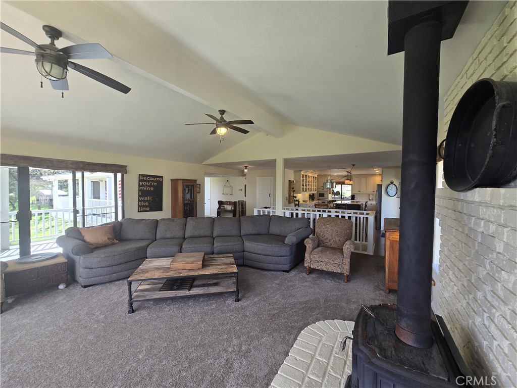 7330 Gage Irving Road Paso Robles, CA 93446 - Photo 14 of 30 a living room with furniture and a fireplace