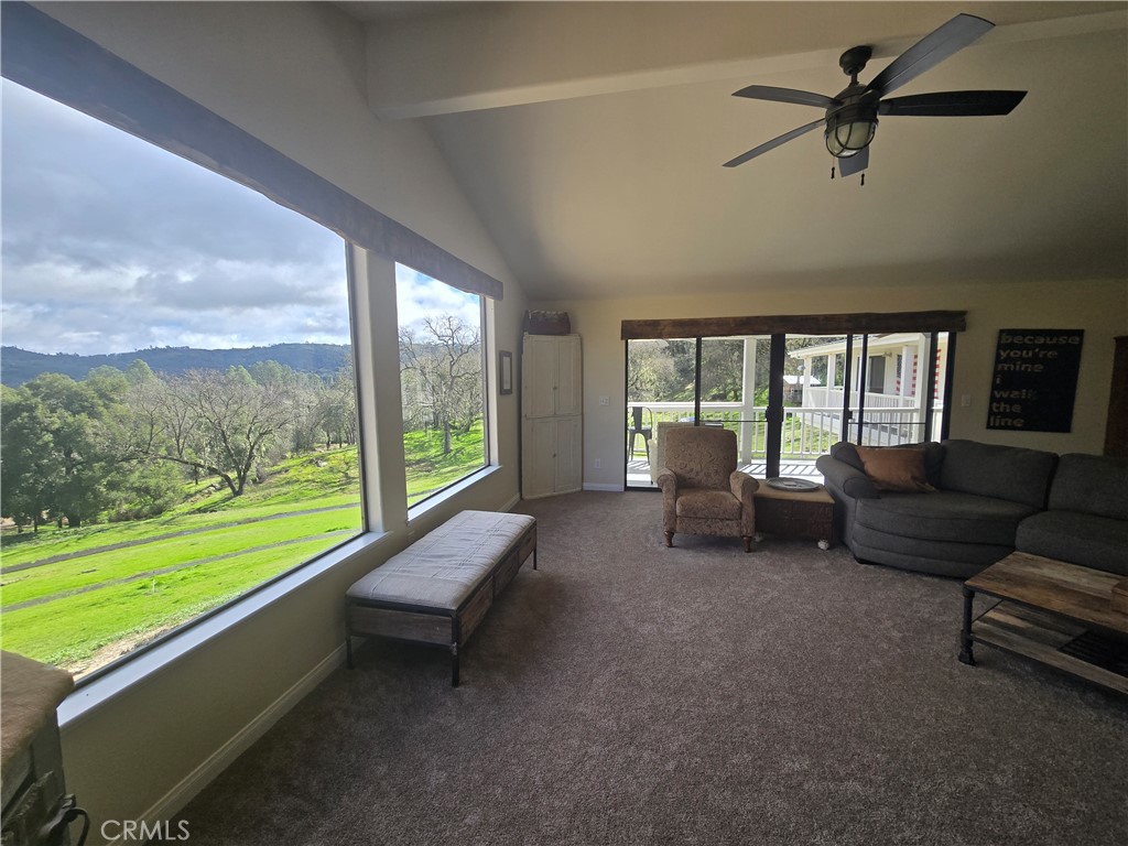 7330 Gage Irving Road Paso Robles, CA 93446 - Photo 15 of 30 a living room with furniture and a floor to ceiling window