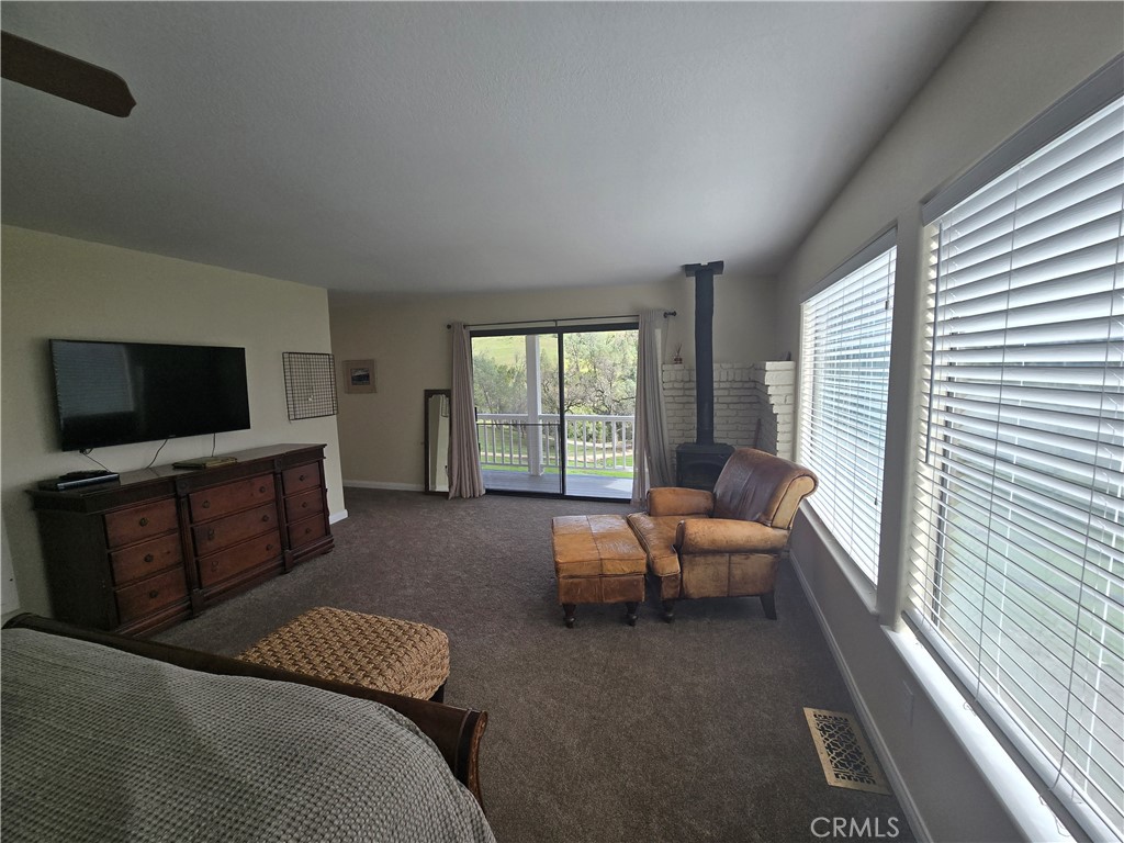 7330 Gage Irving Road Paso Robles, CA 93446 - Photo 16 of 30 a living room with furniture and a flat screen tv