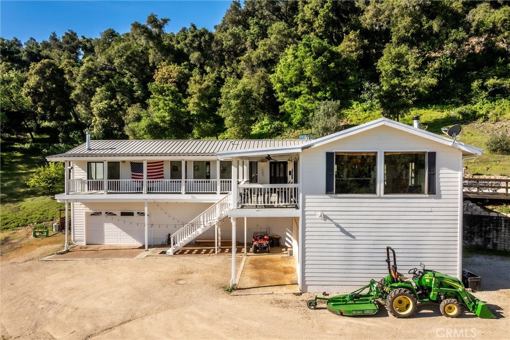 7330 Gage Irving Road Paso Robles, CA 93446 - Photo 3 of 30 a front view of a house with garden