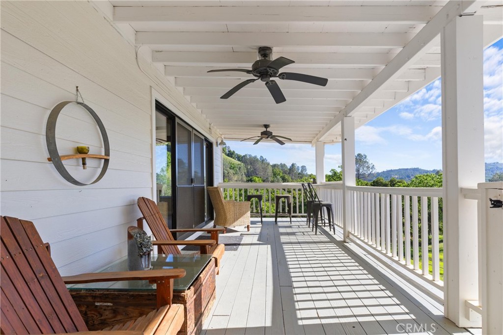 7330 Gage Irving Road Paso Robles, CA 93446 - Photo 7 of 30 a living room with furniture a rug floor and a large window