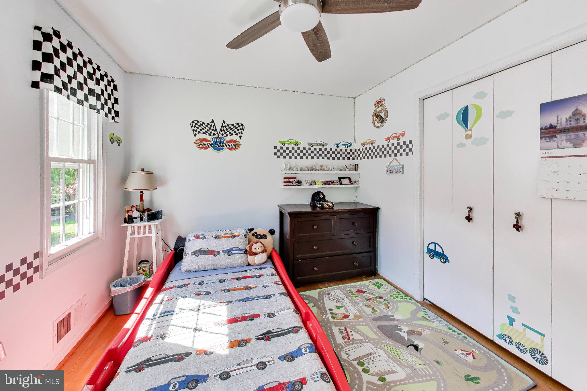 14216 Alderton Road Silver Spring, MD 20906 - Photo 33 of 63 a bedroom with furniture and a window
