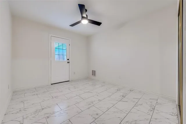 en empty room with white walls