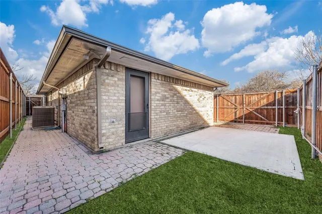 a view of backyard with seating space