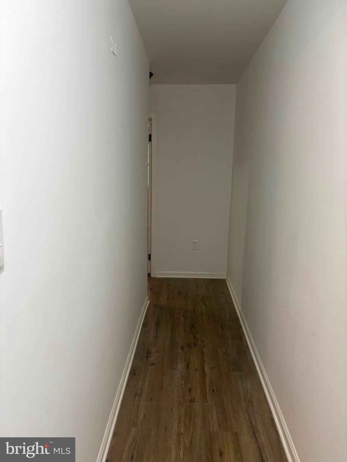 4216 West 7th Street Trainer, PA 19061 - Photo 9 of 26 a view of a hallway with wooden floor