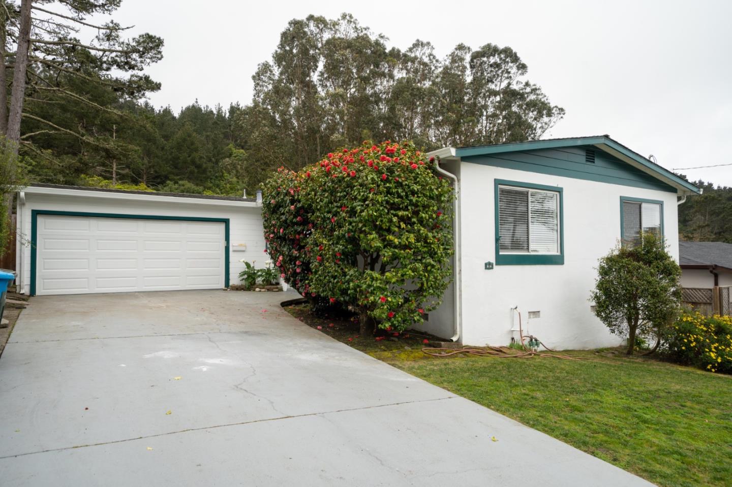 616 Brighton Road Pacifica, CA 94044 - Photo 1 of 14 a front view of house with yard
