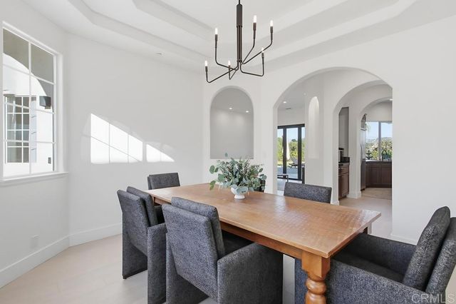 a kitchen with a sink cabinets and stainless steel appliances