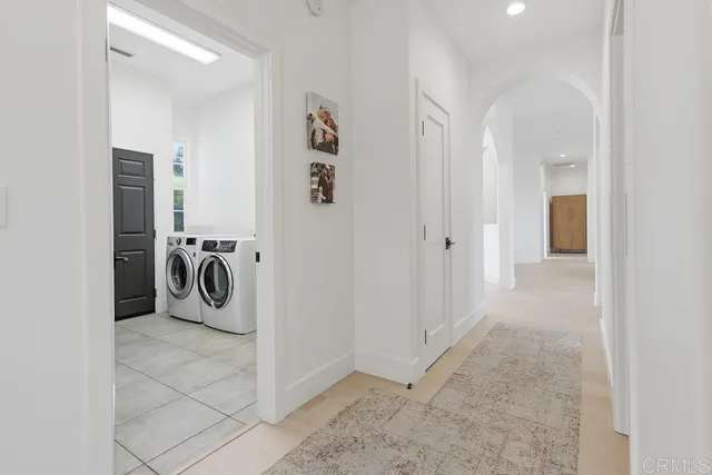 a view of a livingroom with furniture and windows