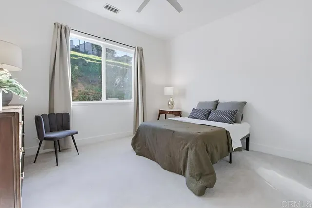 a view of a house with swimming pool and a garden