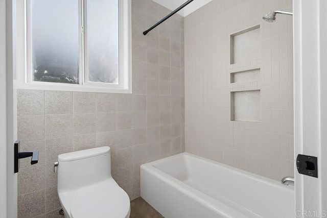 a view of yard with patio