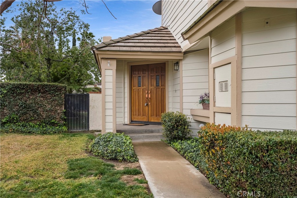2176 Glenview Terrace Riverside, CA 92506 - Photo 2 of 36 a front view of a house with garden