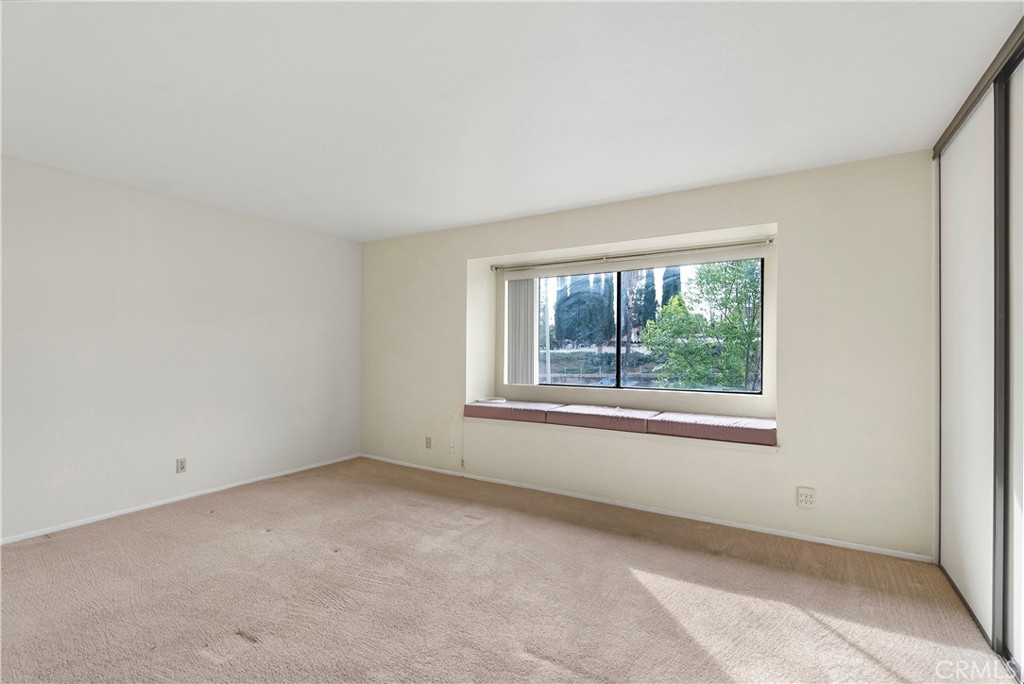2176 Glenview Terrace Riverside, CA 92506 - Photo 22 of 36 an empty room with windows