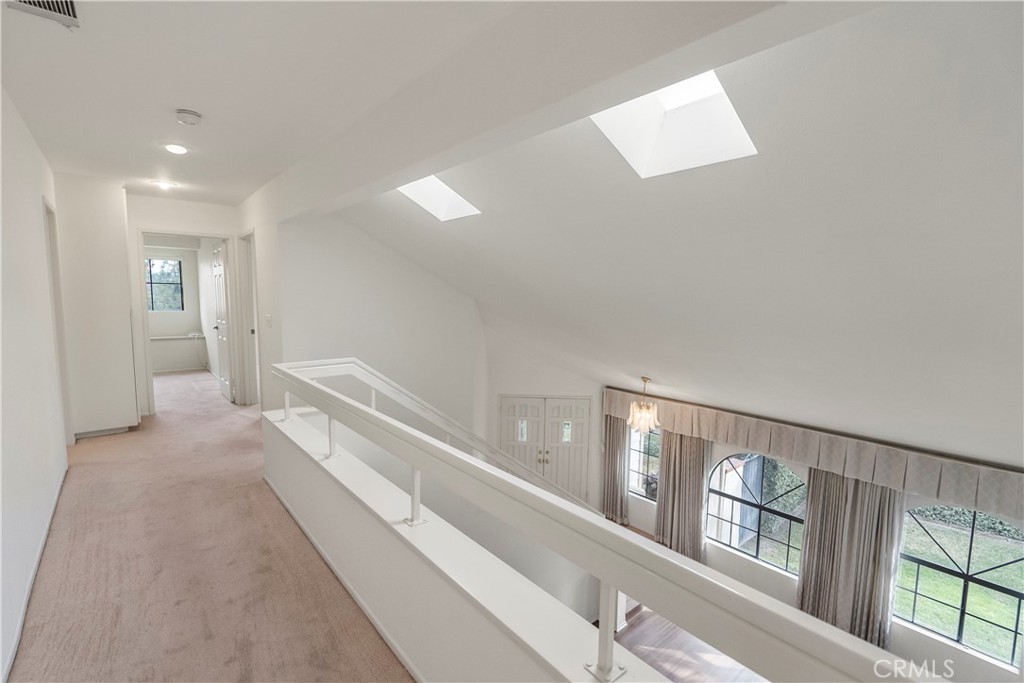 2176 Glenview Terrace Riverside, CA 92506 - Photo 23 of 36 a view of a hallway with staircase