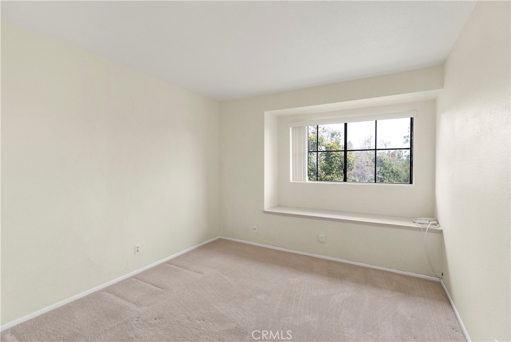 2176 Glenview Terrace Riverside, CA 92506 - Photo 24 of 36 an empty room with a window