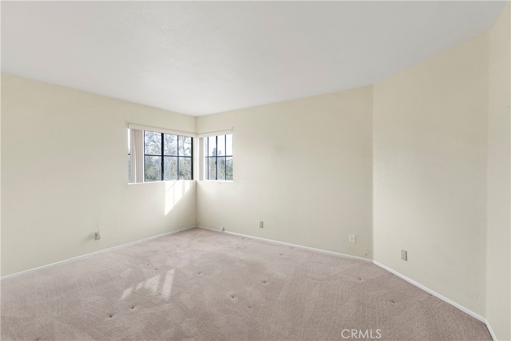 2176 Glenview Terrace Riverside, CA 92506 - Photo 25 of 36 an empty room with windows