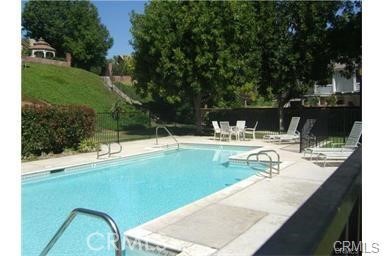 2176 Glenview Terrace Riverside, CA 92506 - Photo 34 of 36 a view of a swimming pool with a patio