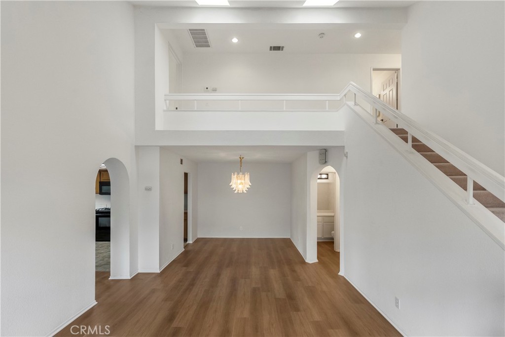 2176 Glenview Terrace Riverside, CA 92506 - Photo 5 of 36 a view of a hallway view with wooden floor and staircase