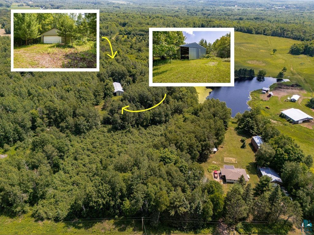 2592 Strandberg Road Barnum, MN 55707 - Photo 3 of 44 Expansive wooded property featuring a natural pond, multiple outbuildings, and a single-story residence